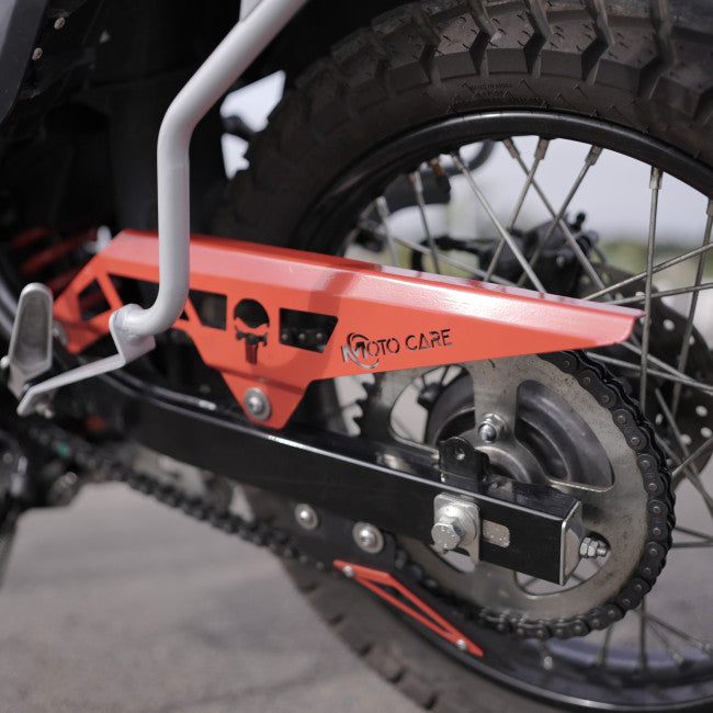 MotoCare red chain guard installed on Hero XPulse 210 protecting chain and sprocket system