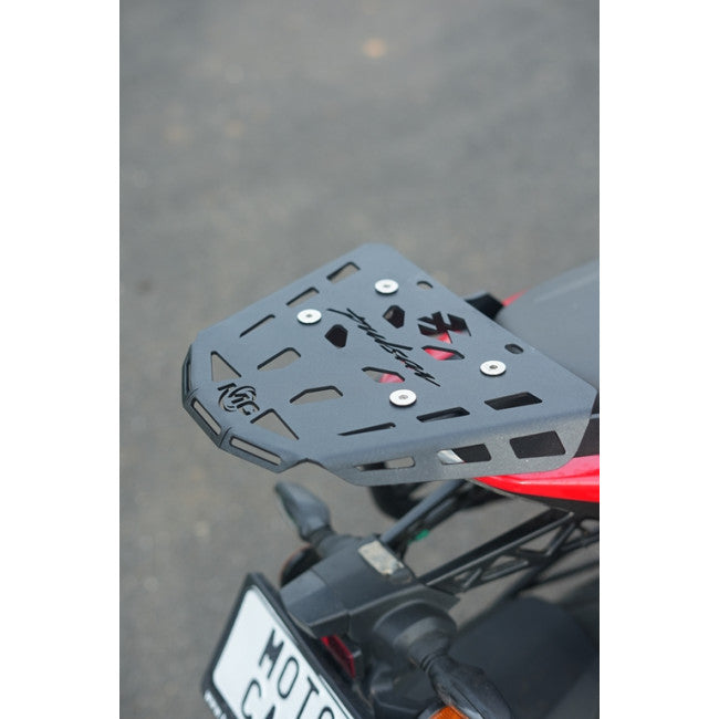 MotoCare CNC Plate Carrier installed on Bajaj Pulsar NS400Z showing underbody protection guard and premium CNC finish