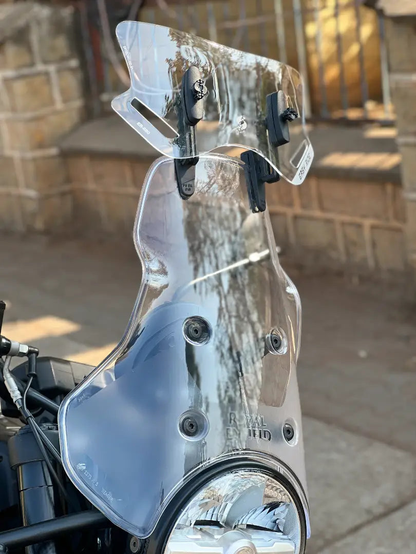 Pro-Spec ER 860 windshield lip extender mounted on Royal Enfield Himalayan 450 touring screen