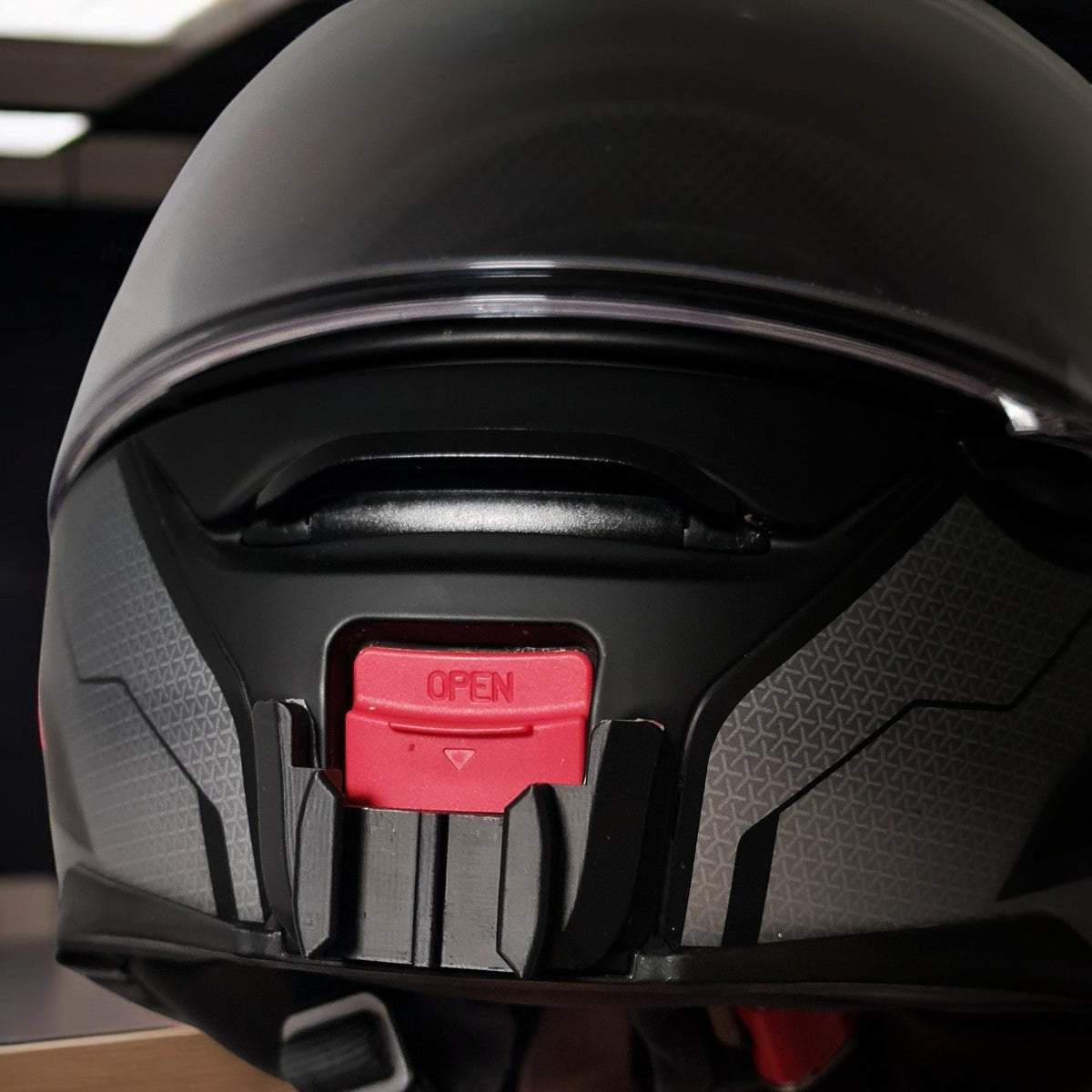 SHOEI Neotec 2 helmet chin mount installed for GoPro and Insta360 POV motovlogging camera setup on motorcycle helmet