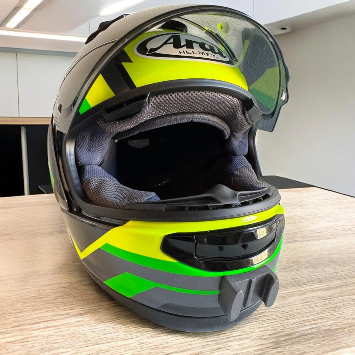 Arai Corsair-X RX-7V RX-7X RX-7 EVO helmet chin mount installed for GoPro POV motovlogging and racing camera setup by Moto Vibe India with strong 3M adhesive mount