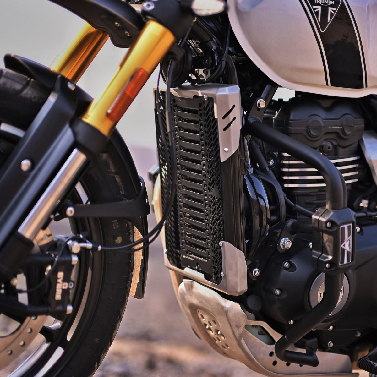 Auto Engina Black-Silver aluminium and stainless steel radiator guard for Triumph Scrambler 400X motorcycle