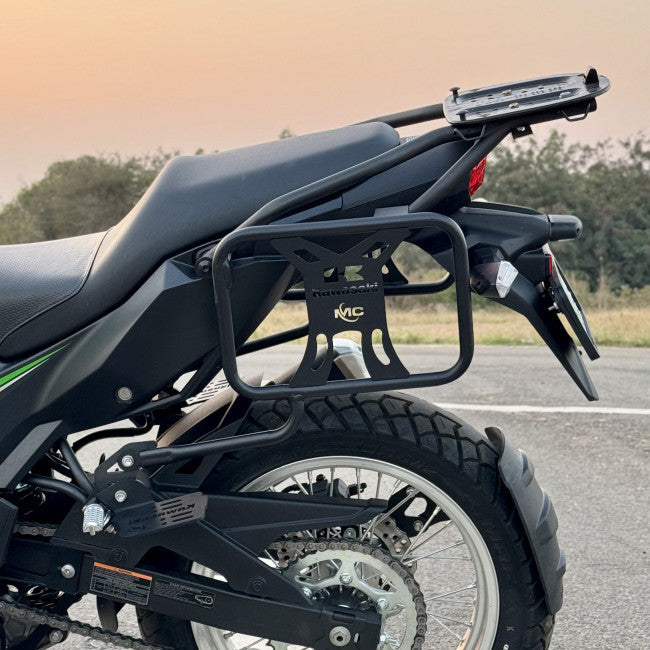 Motocare saddle stay with plate installed on Kawasaki Versys 300 for saddle bag and touring luggage support