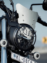 Legundary Mig headlight grill black installed on Hero Mavrick 440 front