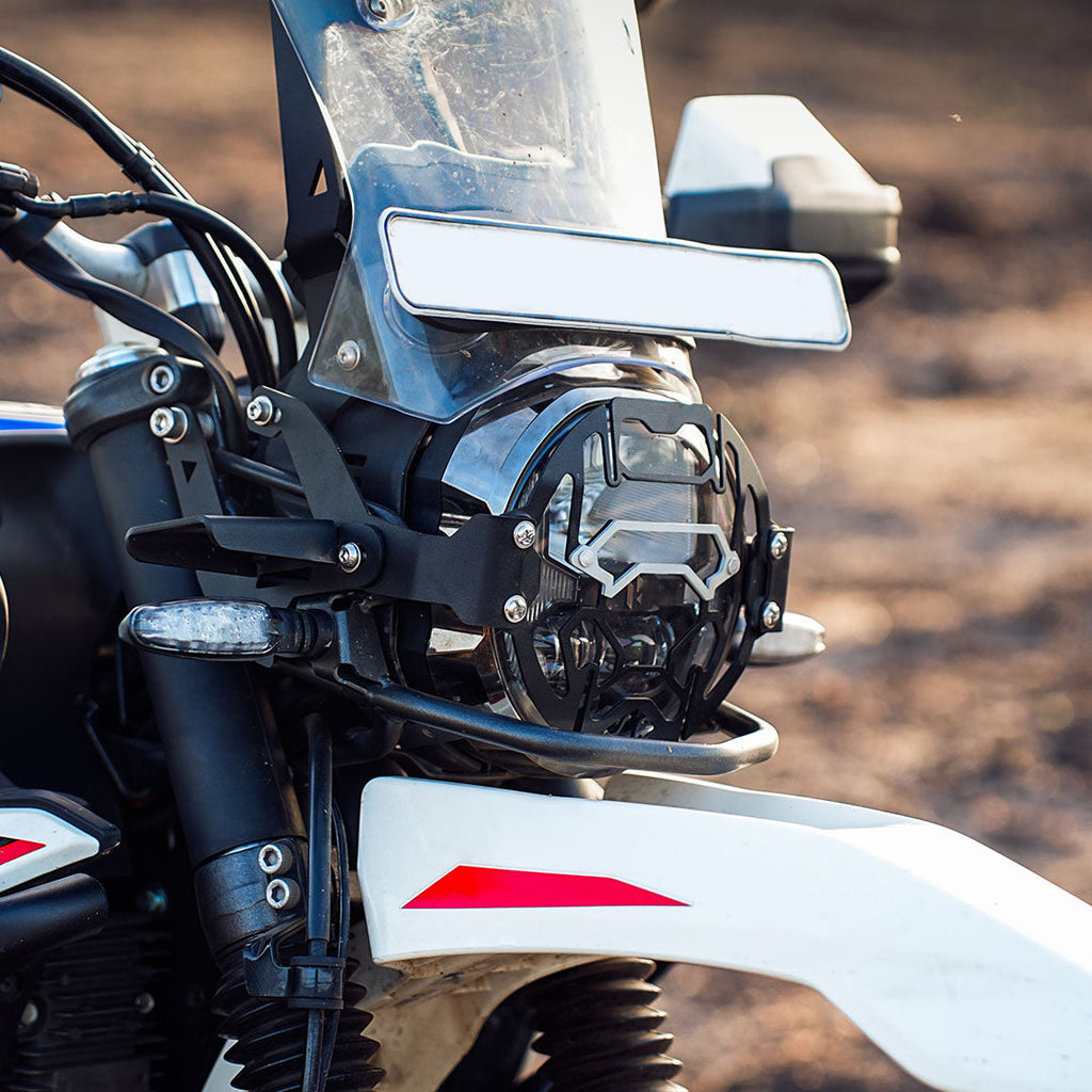 Legundary Cosmic headlight grill black and silver installed on Hero Xpulse 210 protecting headlamp