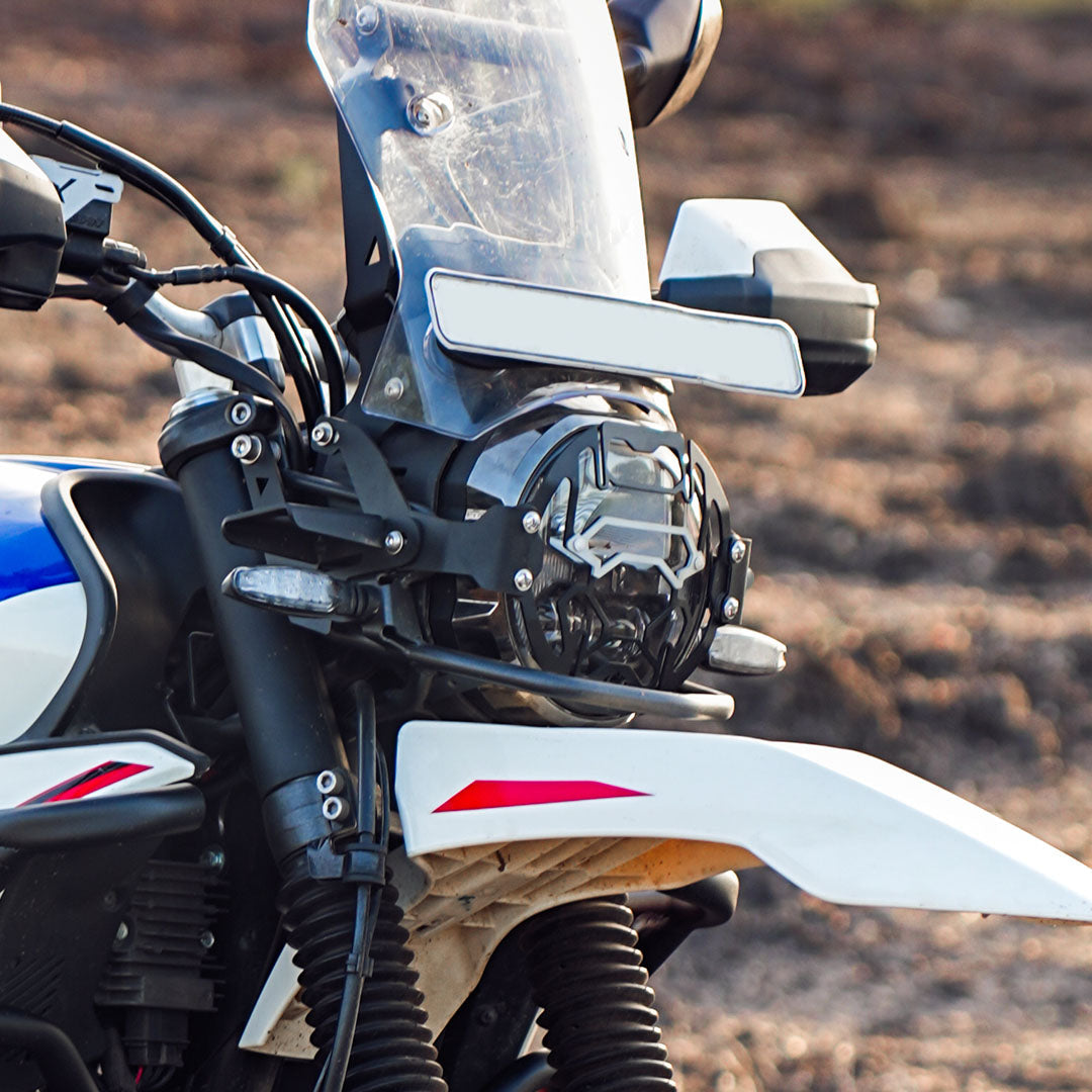 Legundary Cosmic headlight grill black and silver installed on Hero Xpulse 210 protecting headlamp