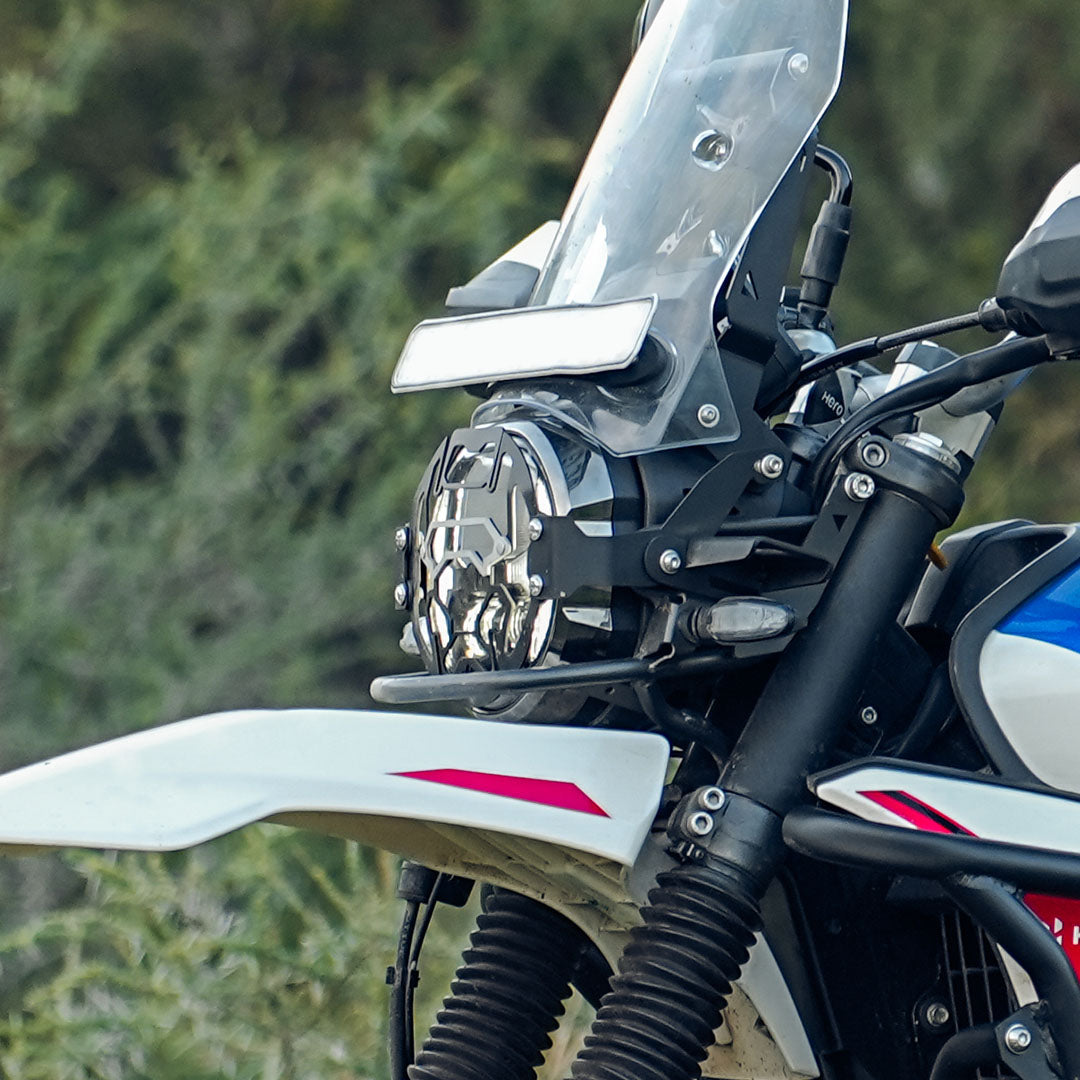 Legundary Cosmic headlight grill black and silver installed on Hero Xpulse 210 protecting headlamp
