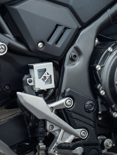 Legundary Custom Spyro rear oil cap for Honda NX500, silver CNC-machined aluminium engine oil cover with durable build and premium finish.