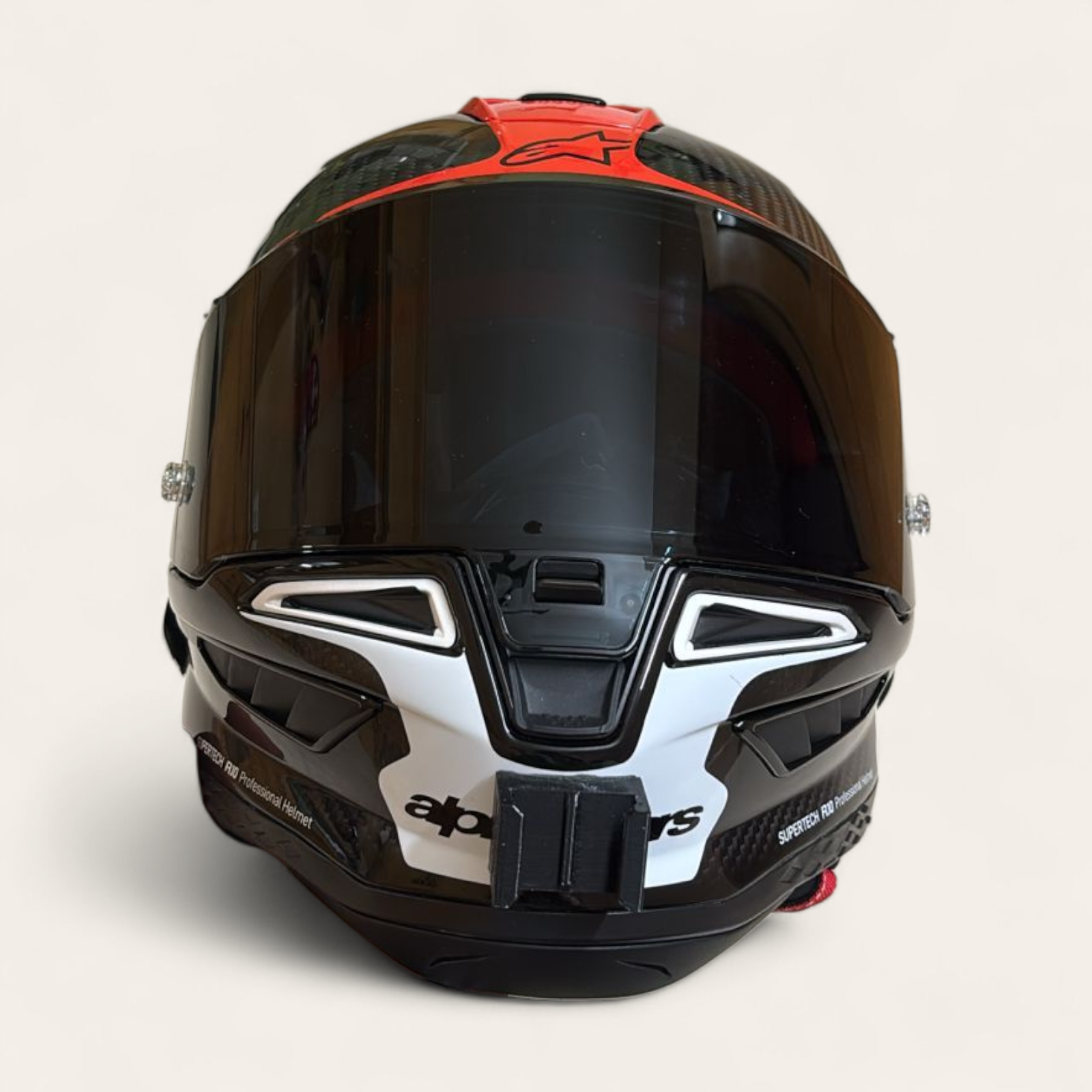 Alpinestars Supertech R-10 SR-10 helmet chin mount installed for GoPro POV motovlogging camera setup by Moto Vibe India with strong 3M adhesive mount
