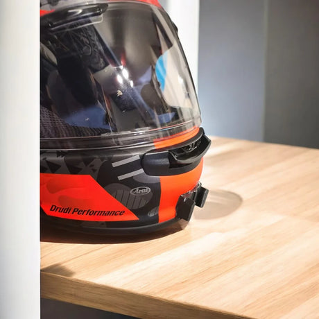 Arai Regent-X Profile-V helmet chin mount installed for GoPro POV motovlogging and touring camera setup by Moto Vibe India with strong 3M adhesive mount