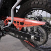 MotoCare red chain guard installed on Hero XPulse 210 protecting chain and sprocket system