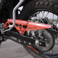MotoCare red chain guard installed on Hero XPulse 210 protecting chain and sprocket system
