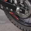 MotoCare red chain sprocket guard installed on Hero XPulse 210 protecting chain and sprocket system