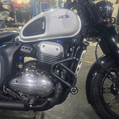 MotoCare crash guard with dual sliders installed on Jawa 42 Bobber motorcycle for engine and frame protection during impact