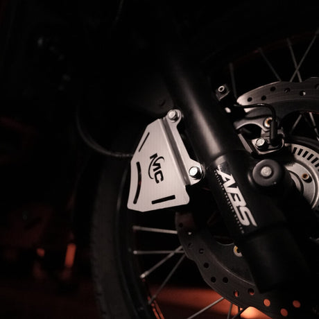 MotoCare Caliper Guard installed on Hero XPulse 210 protecting brake disc and caliper