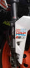 Mototrendz fork seal cover installed on motorcycle front fork