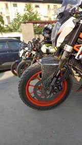 Mototrendz fork seal cover installed on motorcycle front fork