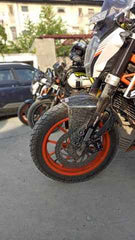 Mototrendz fork seal cover installed on motorcycle front fork