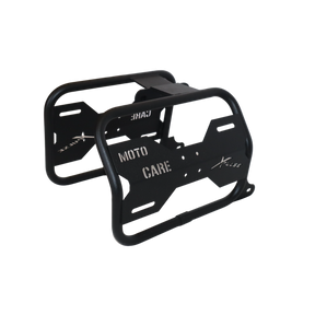 MotoCare saddle stay with plate installed on Hero Xpulse motorcycle supporting saddlebags for touring and off-road stability