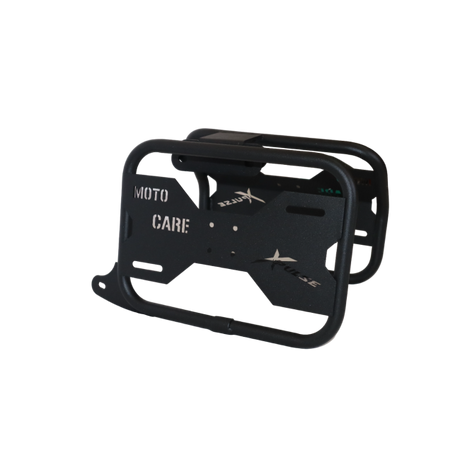 MotoCare saddle stay with plate installed on Hero Xpulse motorcycle supporting saddlebags for touring and off-road stability