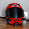 SHOEI X-SPR Pro X15 helmet chin mount installed for GoPro POV motovlogging camera setup on motorcycle helmet