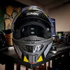SMK Tourer helmet chin mount installed for GoPro Insta360 DJI POV touring motovlogging action camera setup on motorcycle helmet