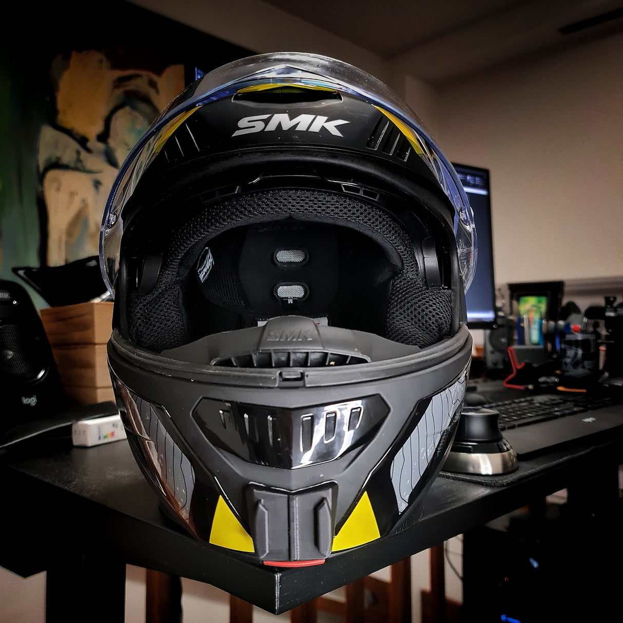 SMK Tourer helmet chin mount installed for GoPro Insta360 DJI POV touring motovlogging action camera setup on motorcycle helmet