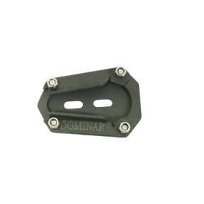 Motocare Dominar 400 stand extender installed on Bajaj Dominar 400 side stand providing enhanced stability and anti-sink support on ground