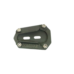 Motocare Dominar 400 stand extender installed on Bajaj Dominar 400 side stand providing enhanced stability and anti-sink support on ground
