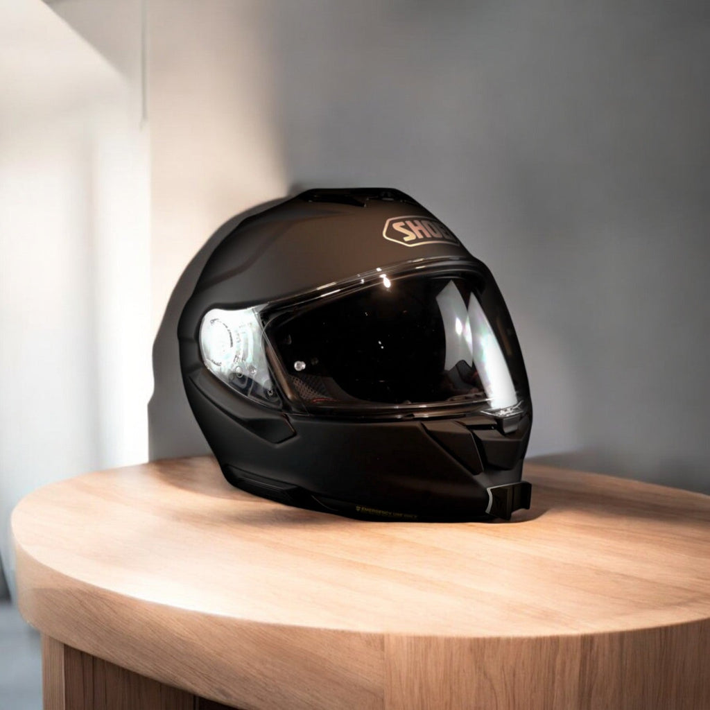 SHOEI GT-Air 3 helmet chin mount installed for GoPro and Insta360 POV motovlogging camera setup on motorcycle helmet