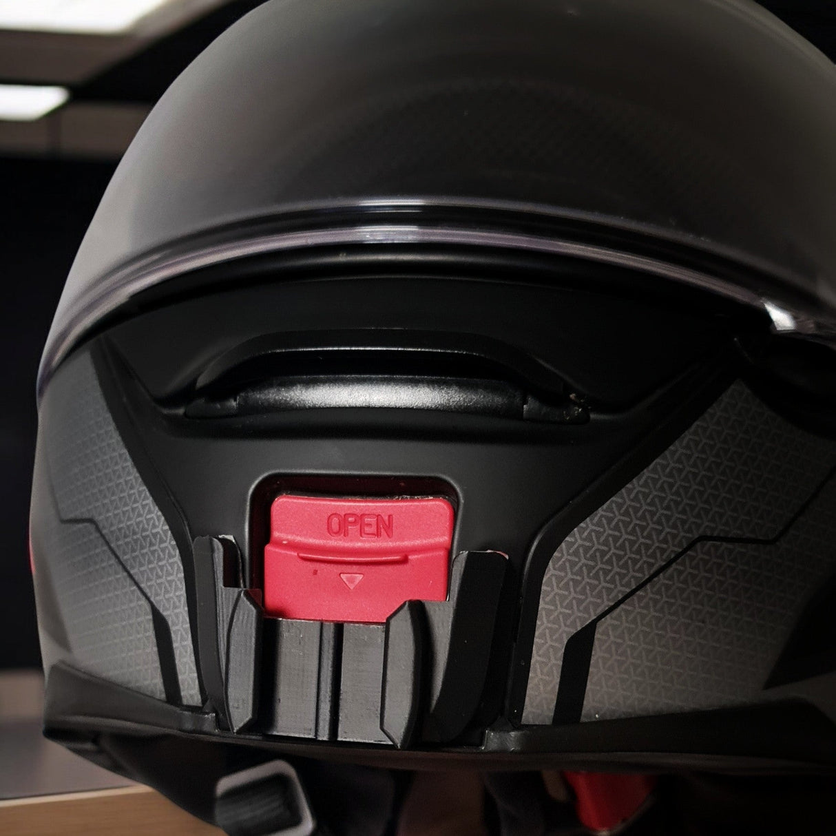 SHOEI Neotec 2 helmet chin mount installed for GoPro and Insta360 POV motovlogging camera setup on motorcycle helmet