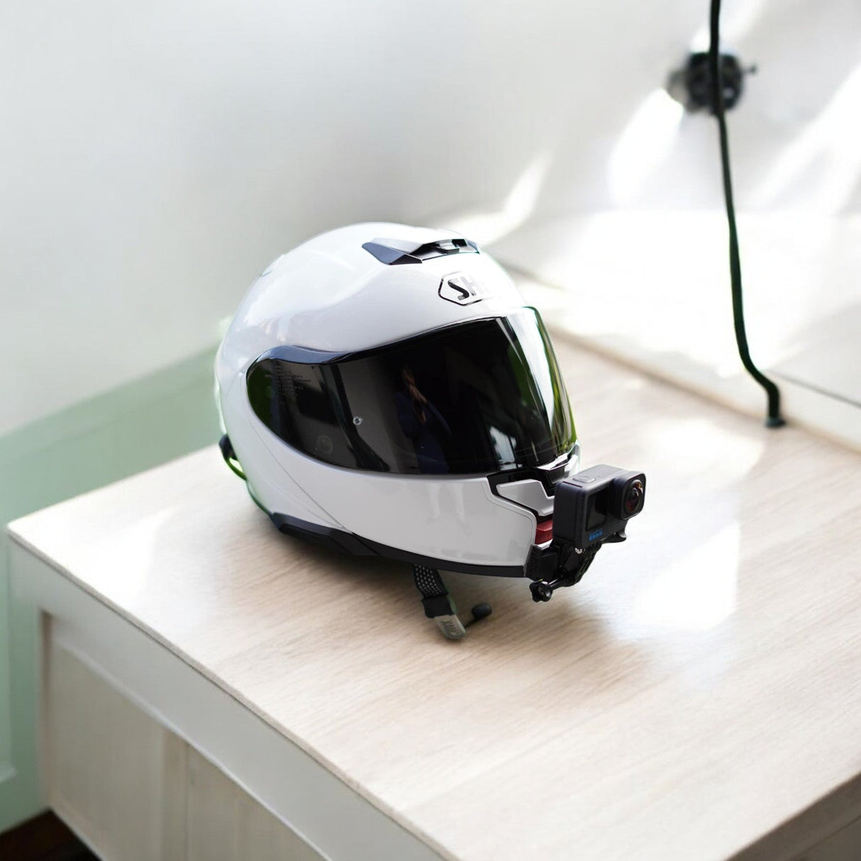 SHOEI Neotec 3 helmet chin mount installed for GoPro and Insta360 POV motovlogging action camera setup
