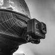 SHOEI RF-1200 NXR Z-7 helmet chin mount installed for GoPro and Insta360 POV motovlogging camera setup on motorcycle helmet