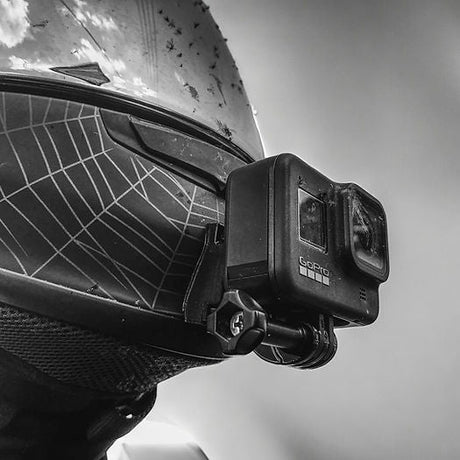 SHOEI RF-1200 NXR Z-7 helmet chin mount installed for GoPro and Insta360 POV motovlogging camera setup on motorcycle helmet