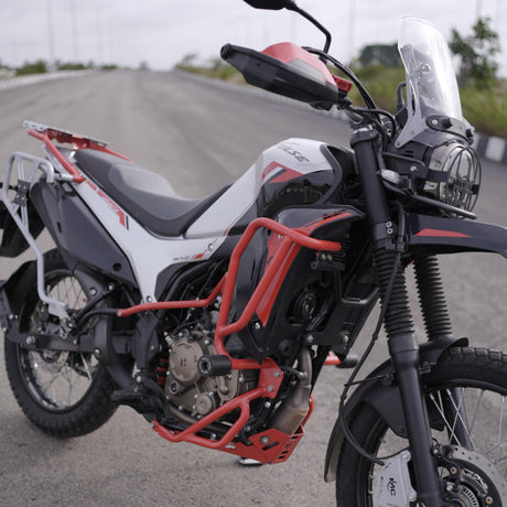 MotoCare red upper lower crash guard installed on Hero XPulse 210 protecting engine and frame