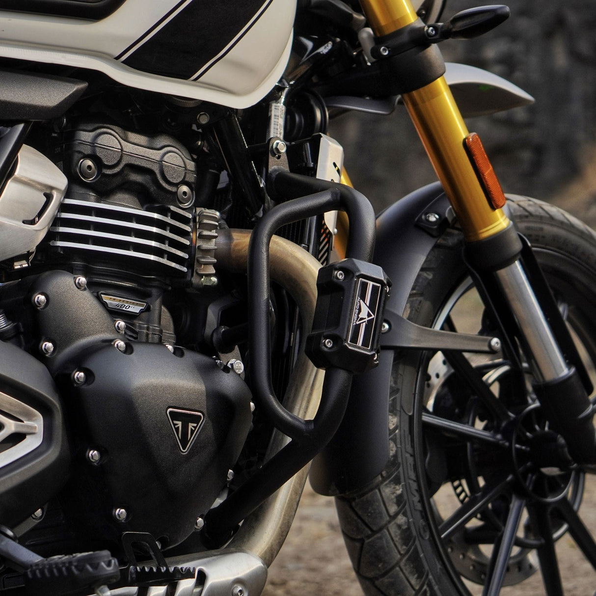 Auto Engina textured black crash guard with built-in sliders for Triumph Scrambler 400X motorcycle