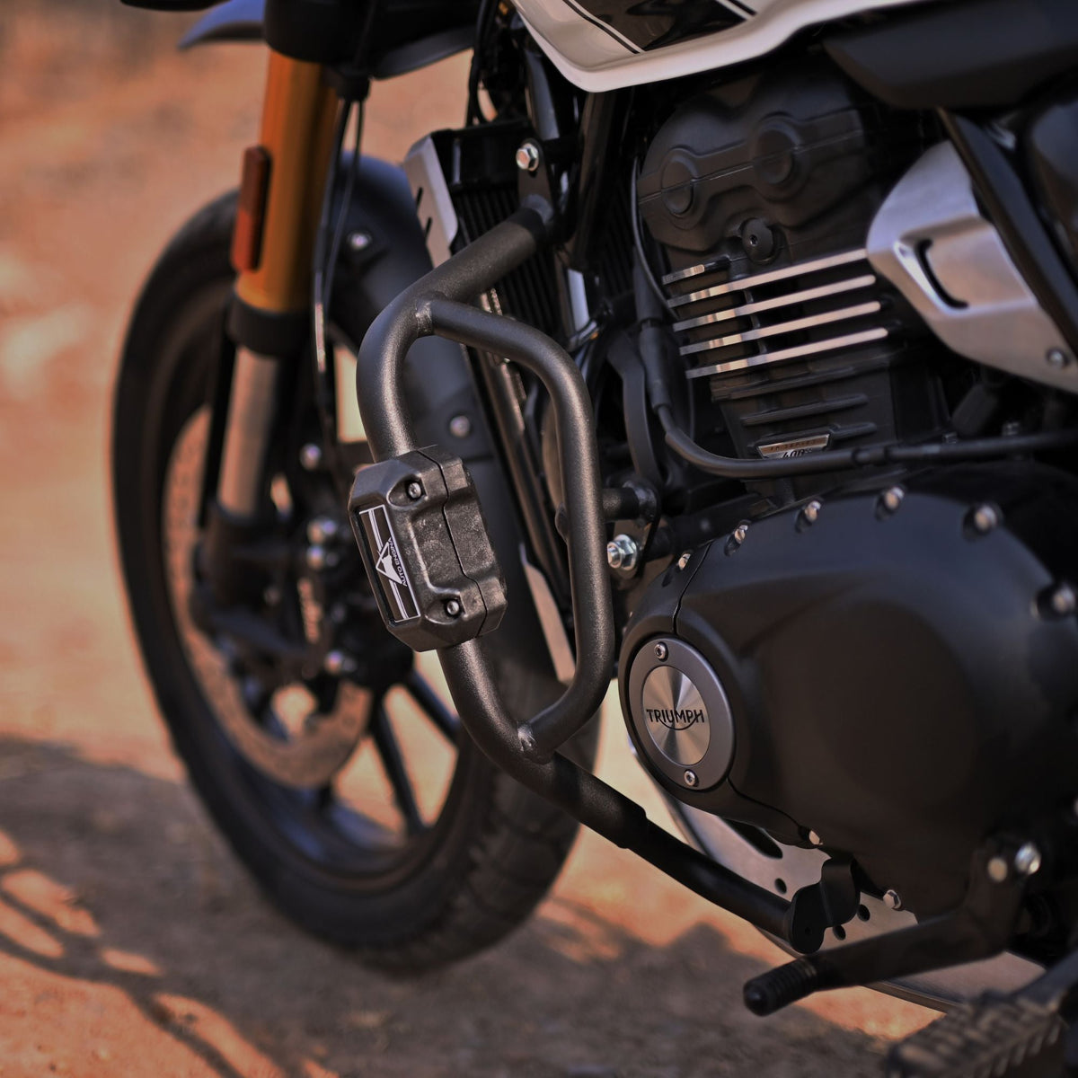 Auto Engina textured black crash guard with built-in sliders for Triumph Scrambler 400X motorcycle